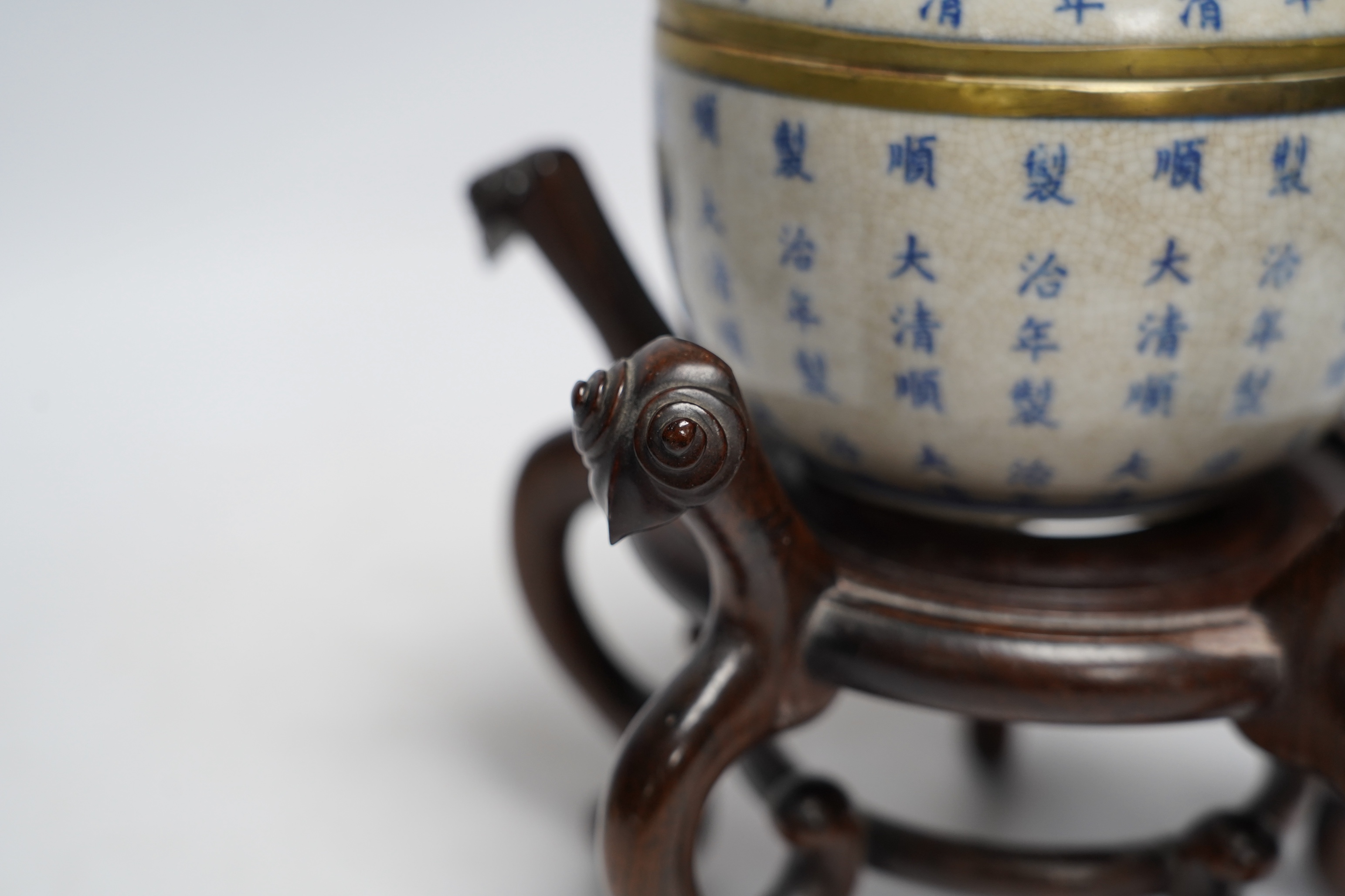 Oriental items to include a cylindrical blue and white vase with associated hardwood stand, a Japanese watercolour painting on silk together with a Japanese bamboo page turner